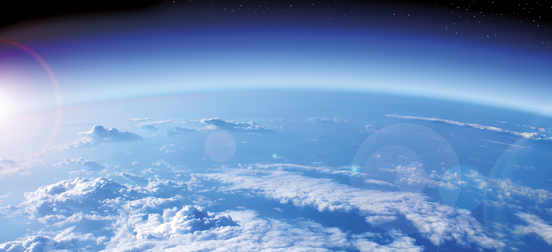 Mood picture: globe and rising sun