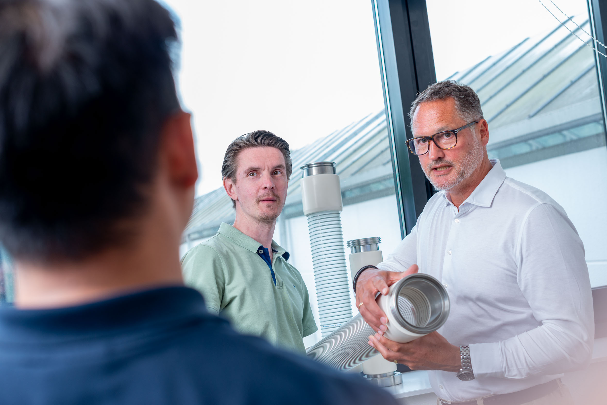 Mood picture: Masterflex sales and development colleagues in conversation